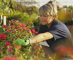 woman smiling with flowers