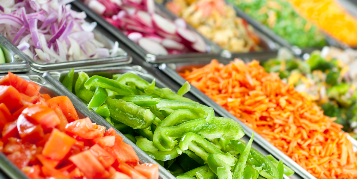 Salad bar with various prepared foods