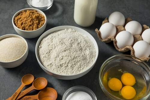 common baking ingredients sitting on a table