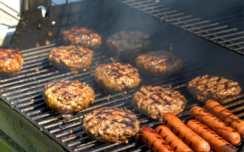 Hamburgers and hot dogs are staples at any family backyard BBQ.