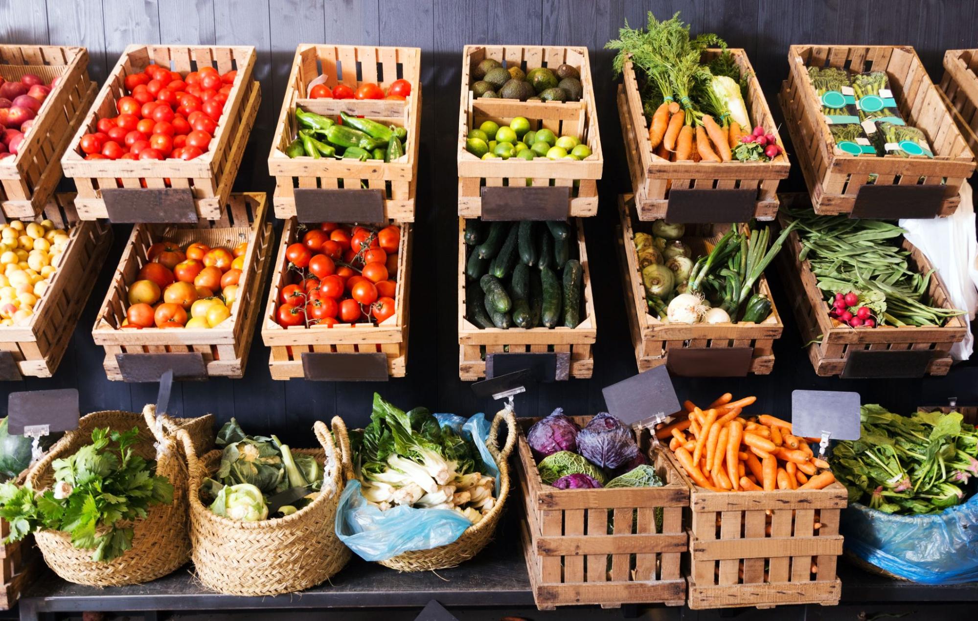 A variety of colorful vegetables for sale at a market.