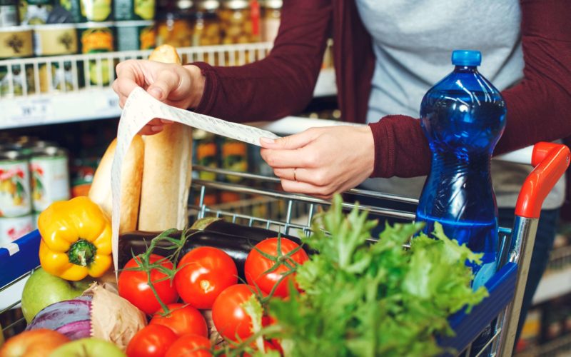 Grocery shopping for healthy foods.