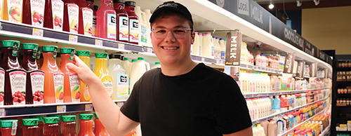 grocery team member in drinks section