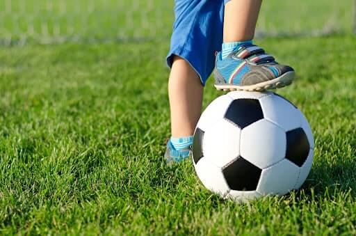 Kid playing soccer 